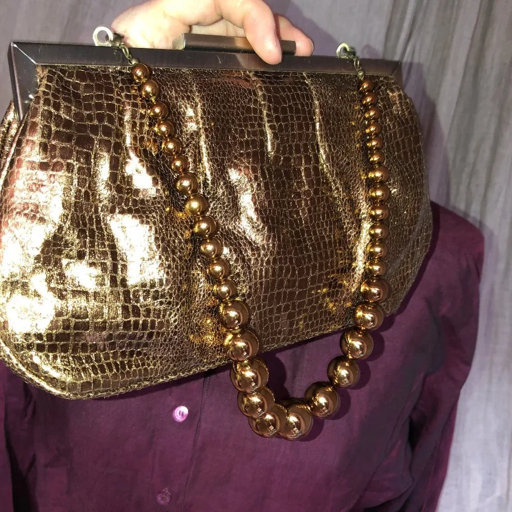 aldo 10x5 Bronze metallic snakeskin clutch